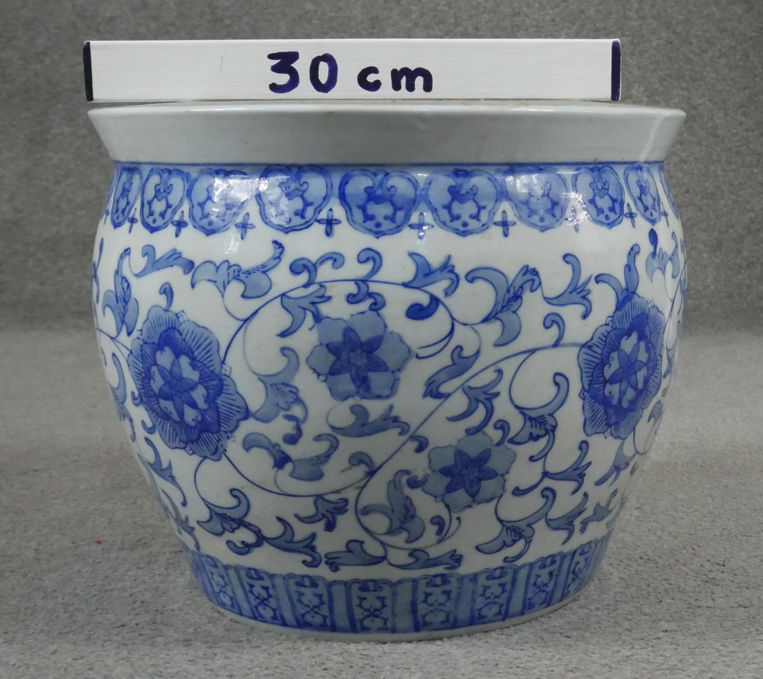 A 20th century Chinese blue and white hand painted umbrella stand decorated with animals and - Image 7 of 8
