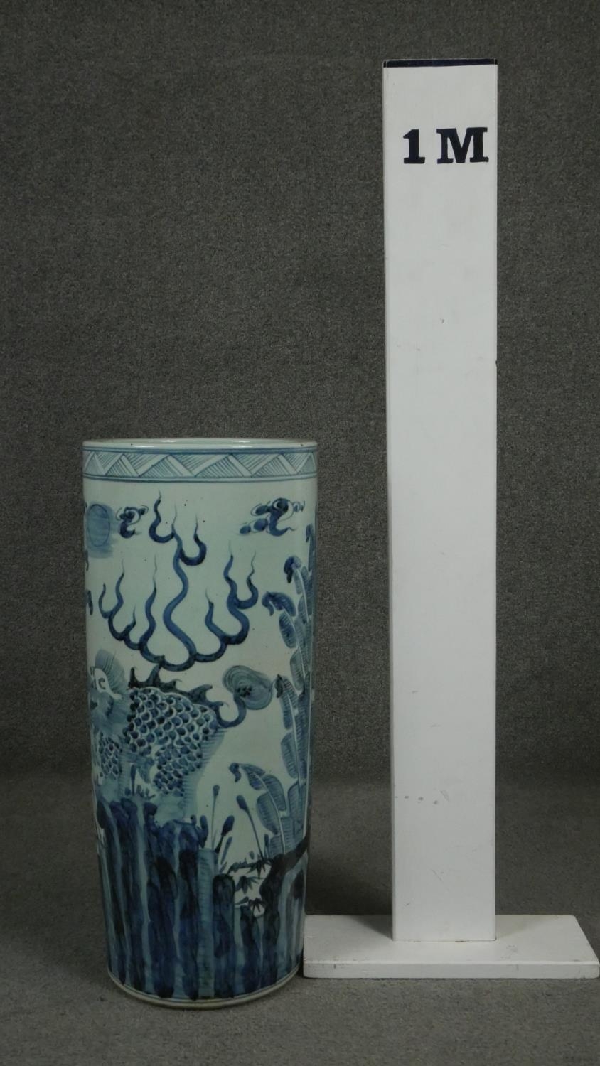 A 20th century Chinese blue and white hand painted umbrella stand decorated with animals and - Image 4 of 8