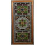 A C.1900 stained and leaded glass panel in mahogany frame. H.107 W.51cm