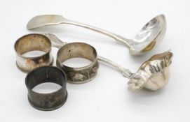 A collection fo white metal and silver items. Including two white metal napkin rings one with