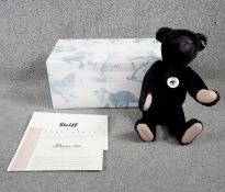 A boxed Steiff 1908 black mohair replica growler teddy bear, no. 2905/3000 with box and