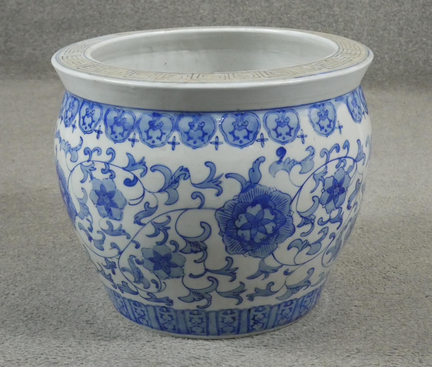 A 20th century Chinese blue and white hand painted umbrella stand decorated with animals and - Image 5 of 8
