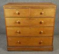 A 19th century pine chest of drawers on plinth base. H.106 W.110 D.57cm