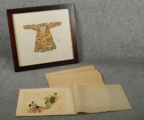 A collection of Japanese book plates with paper protective covers along with a framed and glazed