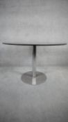 A retro styled glass top occasional table on chrome pedestal base. H.74 W.110 D.110