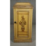 A 19th century painted and stencil decorated pot cupboard. H.74cm