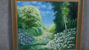 Gerry B Gibbs (b. 1969). A framed oil on board of a garden landscape. Signed Gibbs, dated 1994. H.54