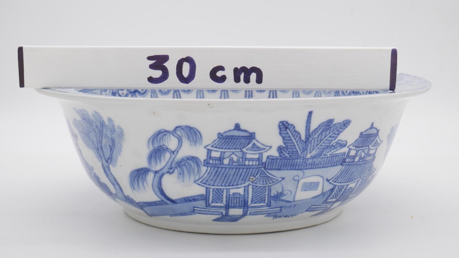 A blue and white Chinese porcelain glazed bowl with stylised floral and foliate design. D.34cm - Image 6 of 6