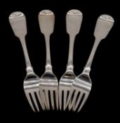 Four Georgian Irish silver filddle pattern serving forks with engraved coat of arms. Hakkmarked: