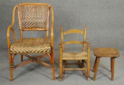 A vintage wicker conservatory chair, a child's armchair and a stool. H.87cm