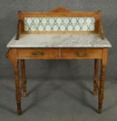 A late Victorian marble topped washstand with tiled back on turned tapering supports. H.102 W.92 D.
