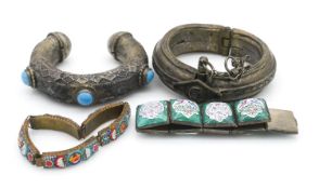A Peking enamel panel articulated bracelet, a micro mosaic floral design bracelet and two white