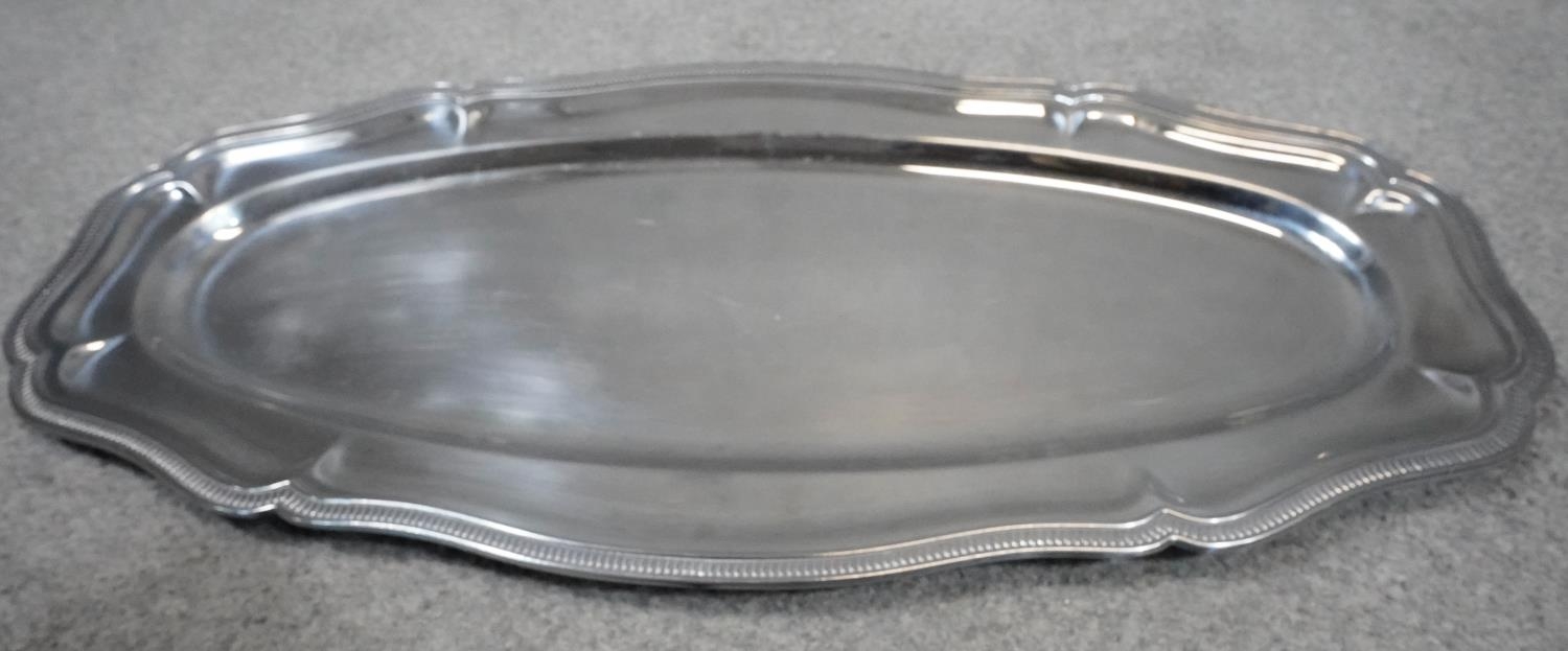 A silver plated oval tray by Guy Degrenne, and a similar tray. W.60cm - Image 4 of 7