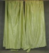 A pair of pale green moire silk taffeta lined curtains. H.265 W.80 W.175cm