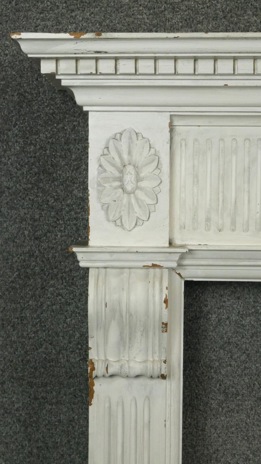 A carved and painted Adam style fire surround with floral swag decoration to the frieze. H.120 W. - Image 3 of 5