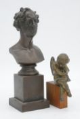 An antique Classical style spelter bust on a square plinth along with a gilt brass cherub seated