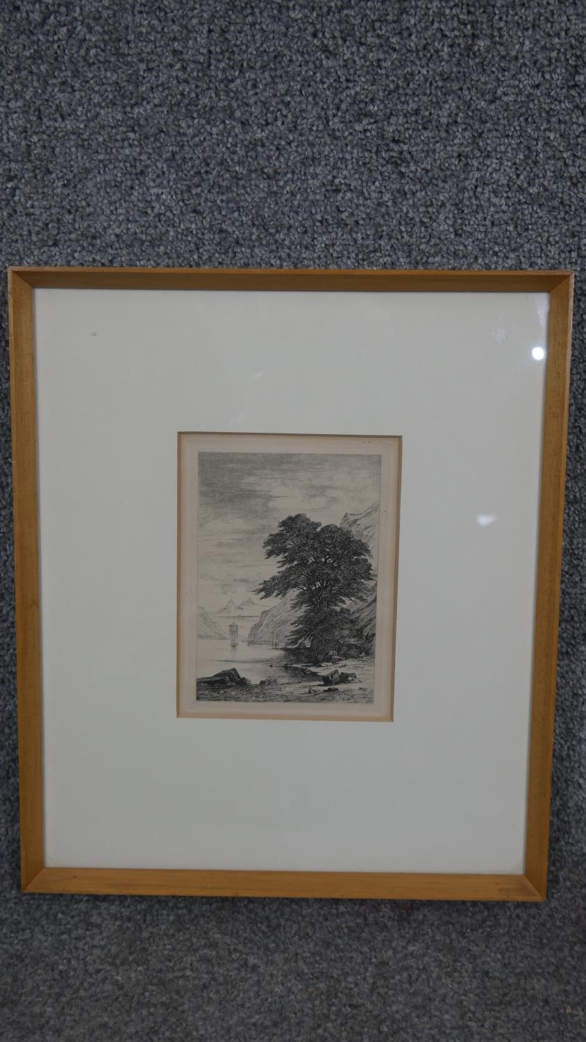 A 19th century framed and glazed etching of a mountain lake with a boat in the background. Titled - Image 2 of 6