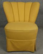 A vintage bedroom chair with scallop upholstered back. H.74cm