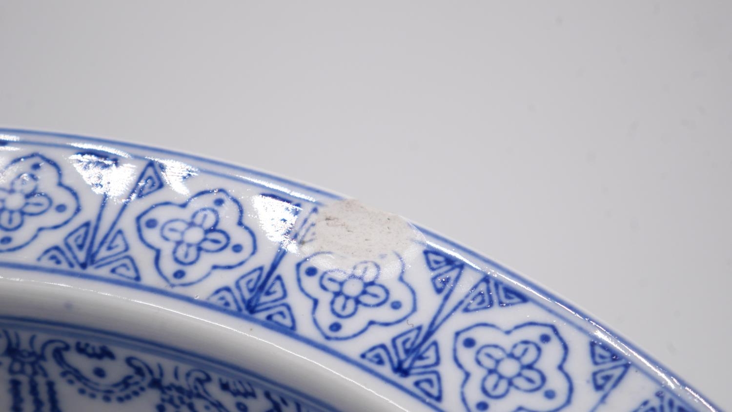 A blue and white Chinese porcelain glazed bowl with stylised floral and foliate design. D.34cm - Image 4 of 6