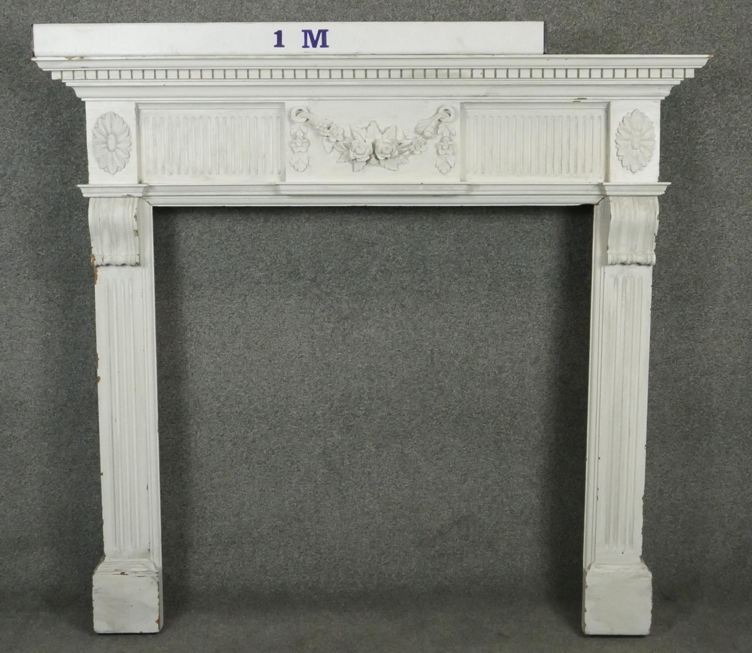 A carved and painted Adam style fire surround with floral swag decoration to the frieze. H.120 W. - Image 5 of 5