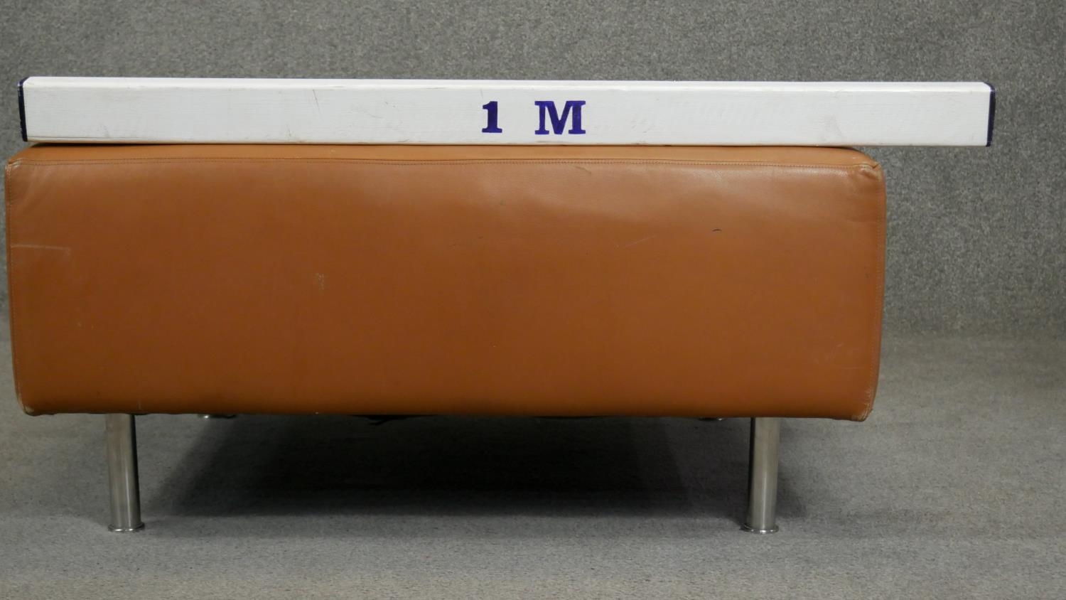 A contemporary Hay 'Mags' footstool upholstered in light tan leather. H.44 W.92 D.80cm - Image 3 of 3