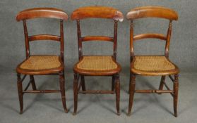 A set of three 19th century beech cane seated bedroom chairs. H.85cm