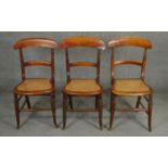 A set of three 19th century beech cane seated bedroom chairs. H.85cm