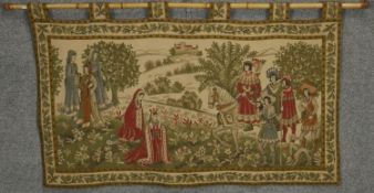 A scenic view on a fine tapestry with hanging bamboo pole. H.70 W.114cm