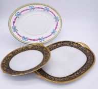 Two Minton porcelain royal blue and gilt stylised foliate design serving platters along with a