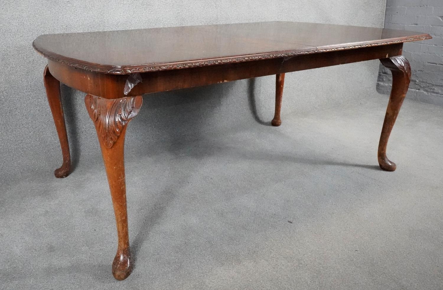 A mid century burr walnut Queen Anne style dining table with extra leaf. H.76 W.233 D.107cm - Image 4 of 7