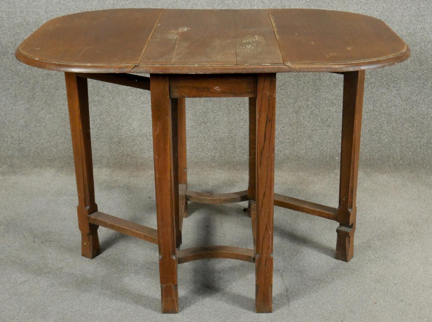 A mid century oak drop leaf table. H.73 W.34 D.76cm - Image 4 of 6