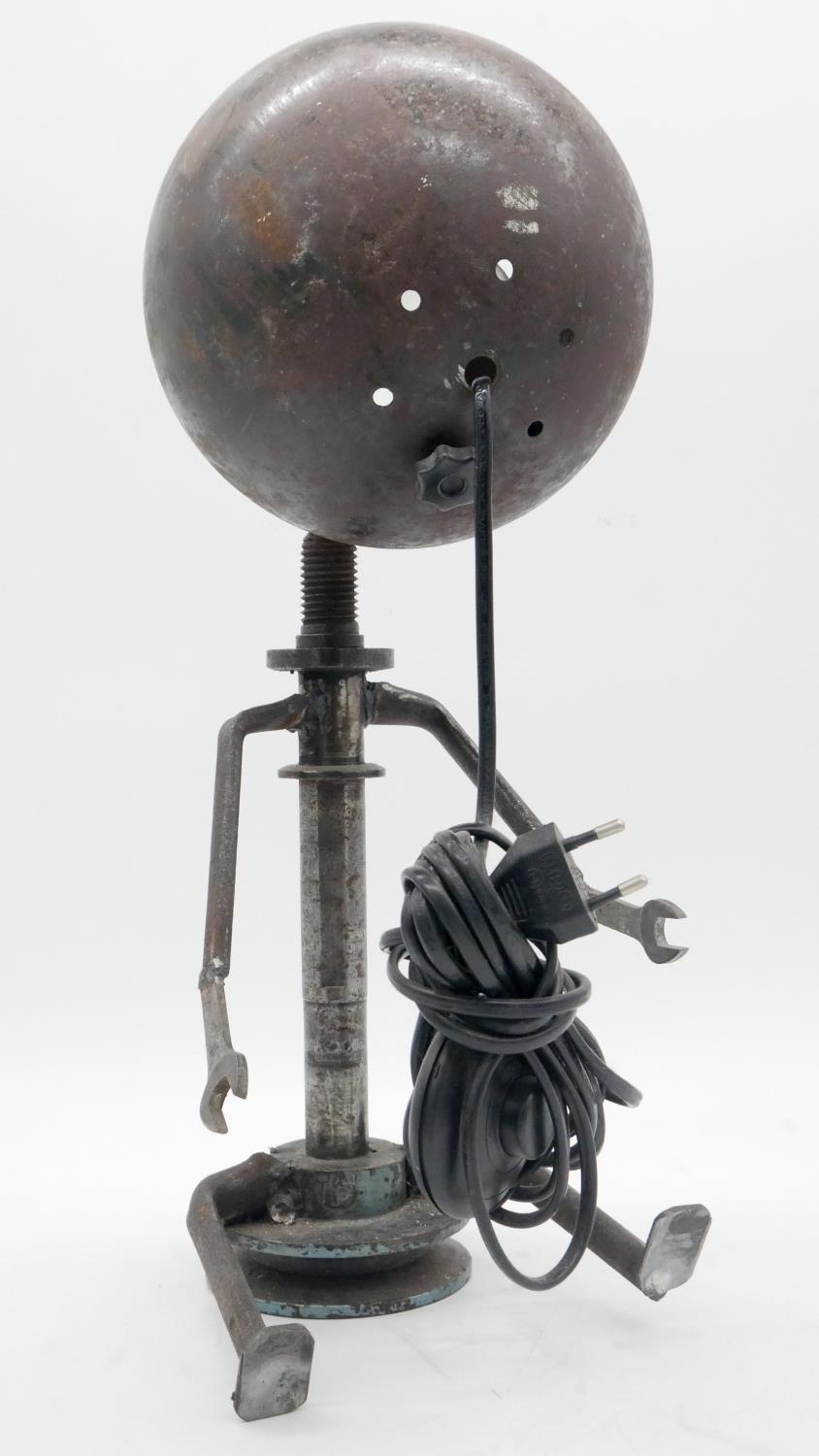 An industrial table lamp in the form of a seated figure with shade for the head. H.45cm - Image 3 of 4