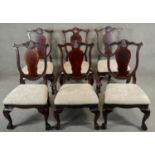 A set of six mahogany early Georgian style dining chairs with shaped shell carved splats above