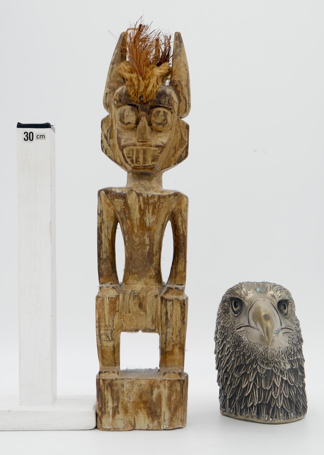 A carved wooden tribal figure along with a cast silver plated eagles head, a double dragon stamp - Image 7 of 7