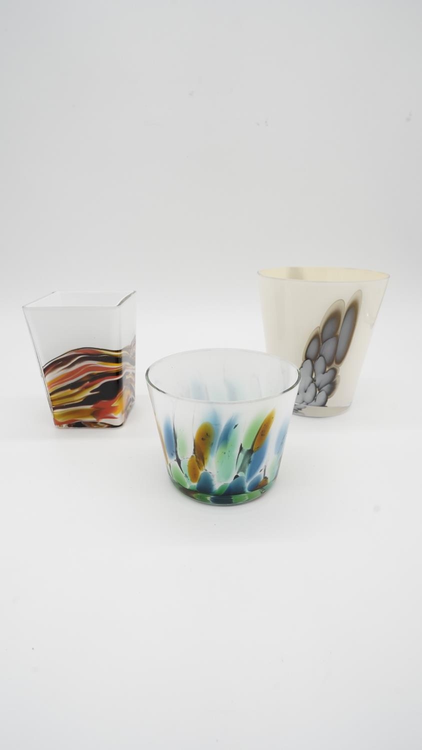 Three Art Glass vases with coloured marbling to the clear glass with opaque white glass core. H.16