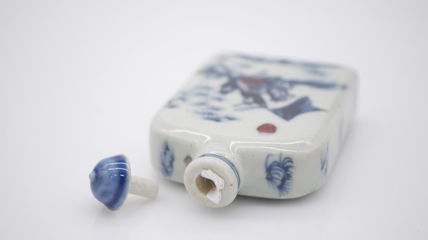 Two Chinese hand painted blue and white porcelain snuff bottles with blue glazed stoppers. One - Image 4 of 8