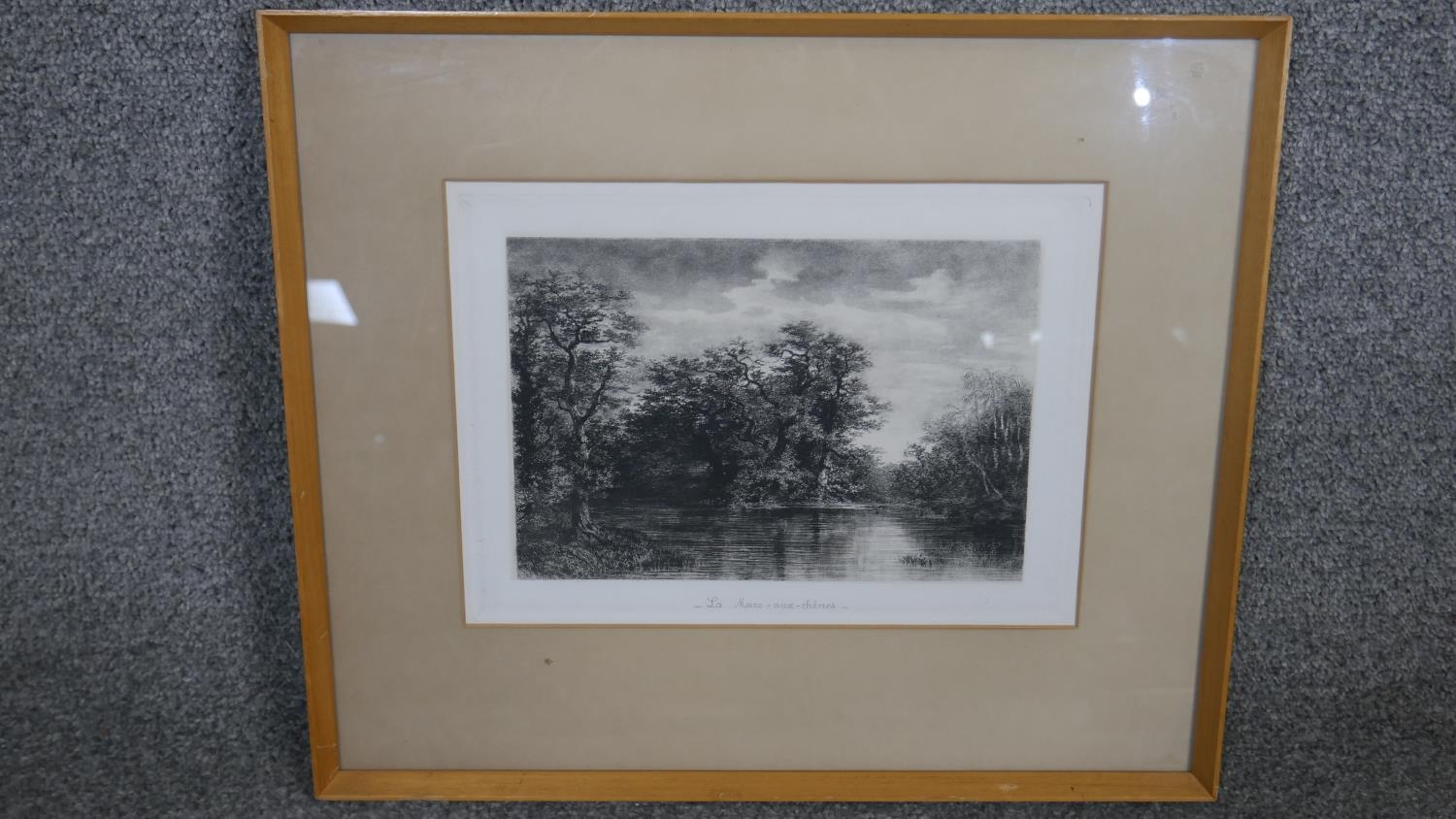 A framed and glazed etching of a lake scene titled 'La Mare aux Chenes'. H.37 W.43cm - Image 2 of 4