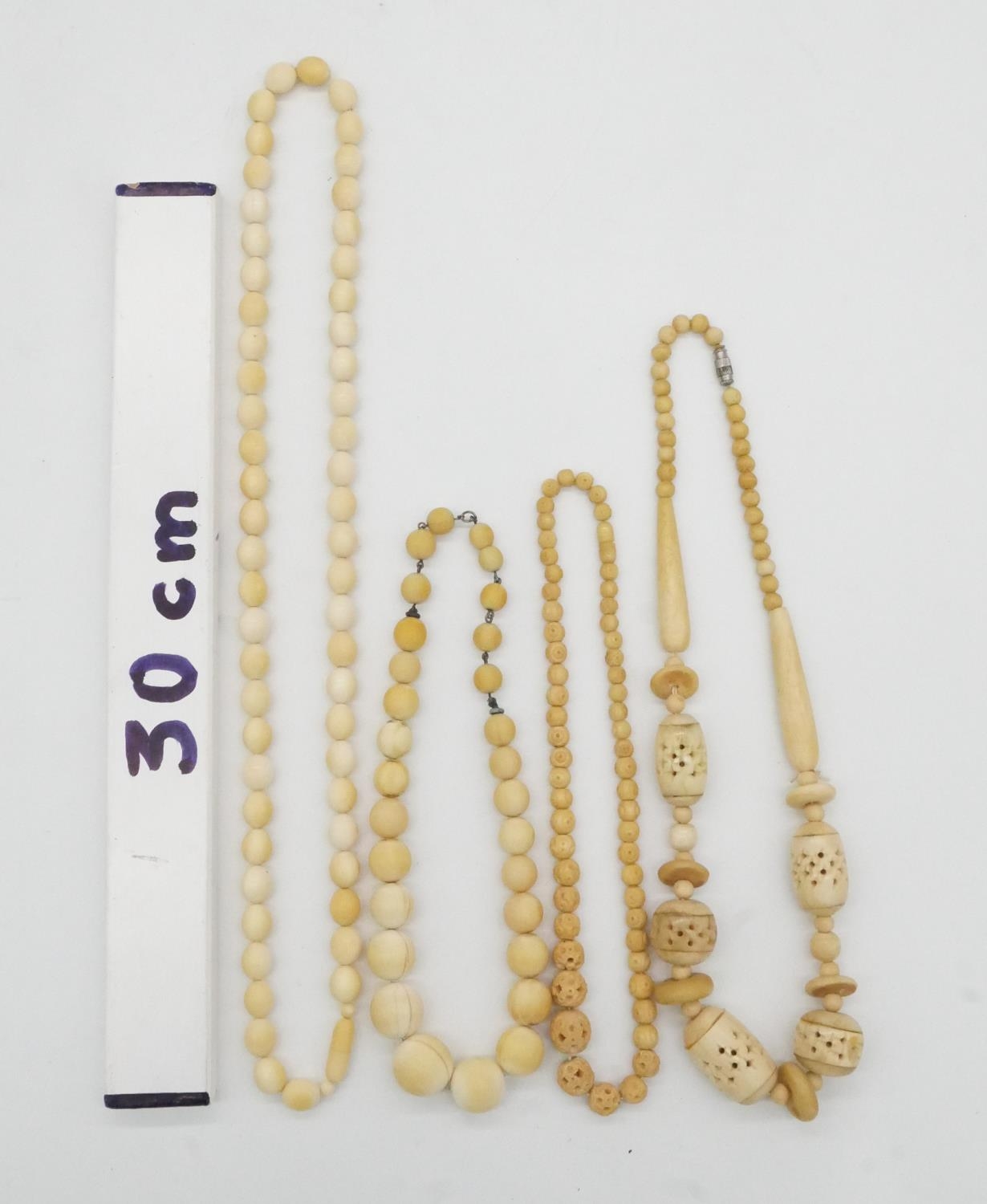 Two Victorian carved graduated ivory bead necklaces along with two Indian pierced bone bead - Image 10 of 10