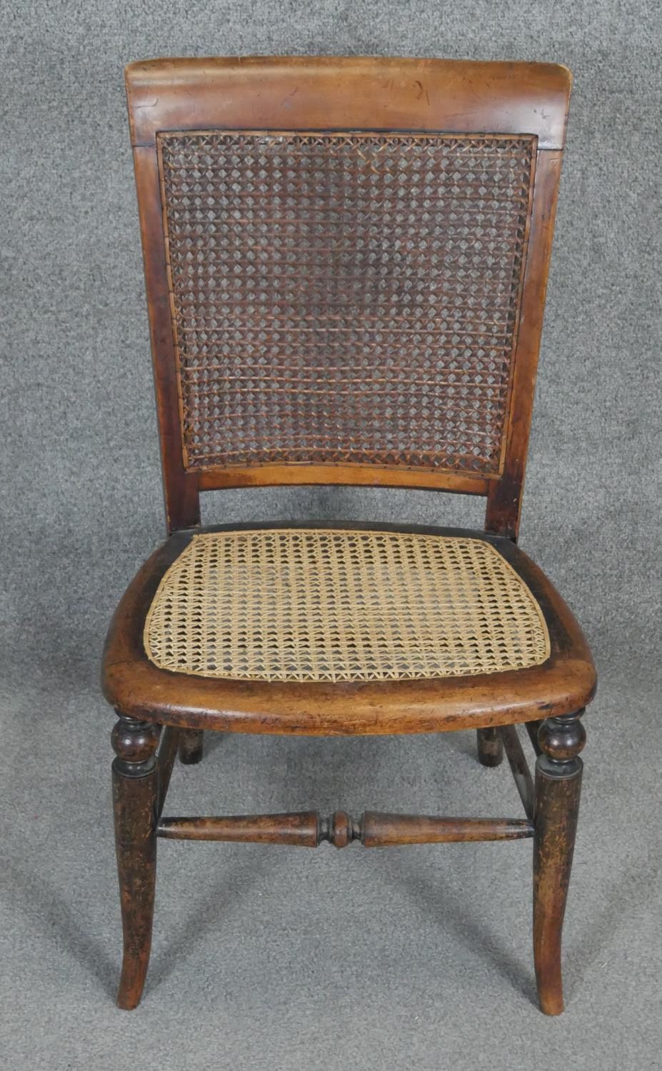 A 19th century walnut bedroom chair with woven seat and a similar caned seat beech chair. - Image 2 of 3