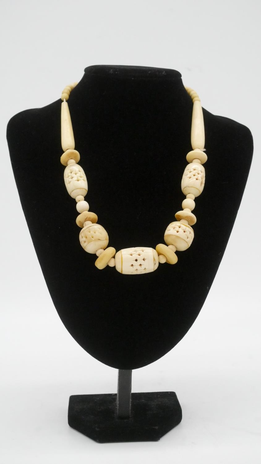 Two Victorian carved graduated ivory bead necklaces along with two Indian pierced bone bead - Image 4 of 10