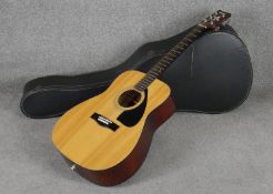 Yamaha FG-410 series acoustic guitar, made in Taiwan, together with hard case.