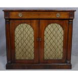 A Regency rosewood chiffonier with frieze drawer above arched metal grille doors and pleated silk