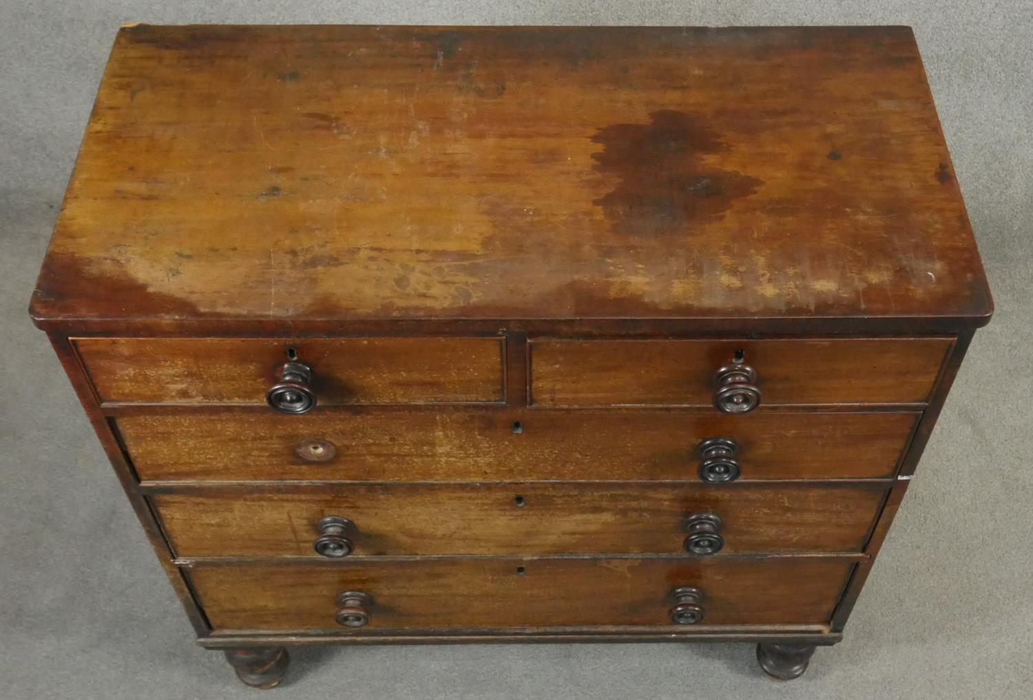 A 19th century mahogany chest of drawers on turned supports. H.103 W.102 D.52cm - Image 4 of 4