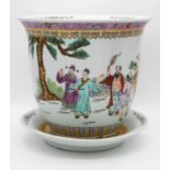 An early 20th century Chinese Famille Rose hand painted porcelain jardinere with dish. Decorated