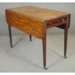 A 19th century mahogany, satinwood and ebony strung drop flap Pembroke table on square tapering