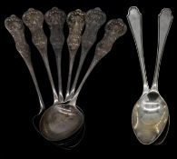 Eight silver tea spoons. A set of six Scottish repousse design tea spoons, hallmarked: W.C. for
