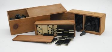 Three antique and vintage wooden boxed game sets. Two chess sets, one Staunton style pieces with
