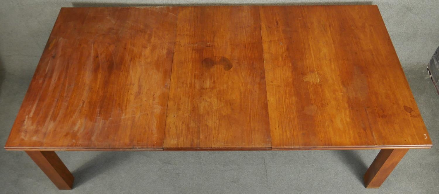 A large hardwood dining table on square supports with fixed central leaf. H.76 L.245 D.122cm - Image 3 of 5