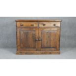 A Victorian style stained pine side cabinet with later fitted interior. H97 W124 D61cm