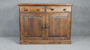 A Victorian style stained pine side cabinet with later fitted interior. H97 W124 D61cm